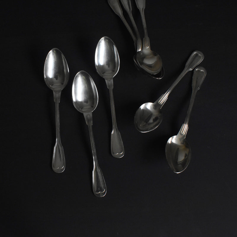 Vintage silver-plated dessert spoon with monogram