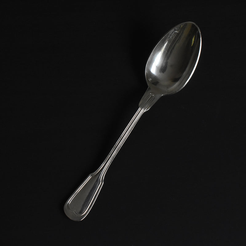Vintage silver-plated dessert spoon with monogram