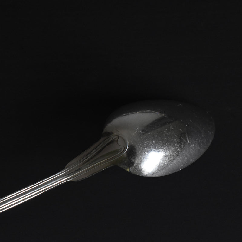 Vintage silver-plated dessert spoon with monogram