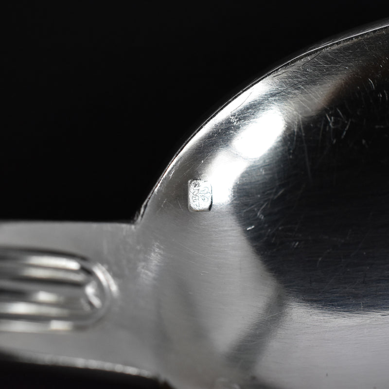 Vintage silver-plated dessert spoon with monogram