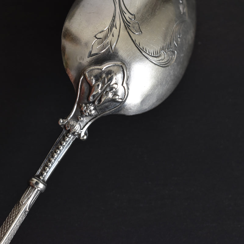 Antique silver dessert spoon by Edmond Bonnesoeur