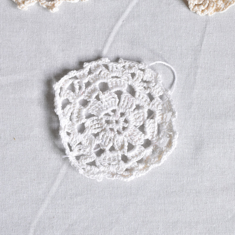 Vintage hand-knitted lace ornament