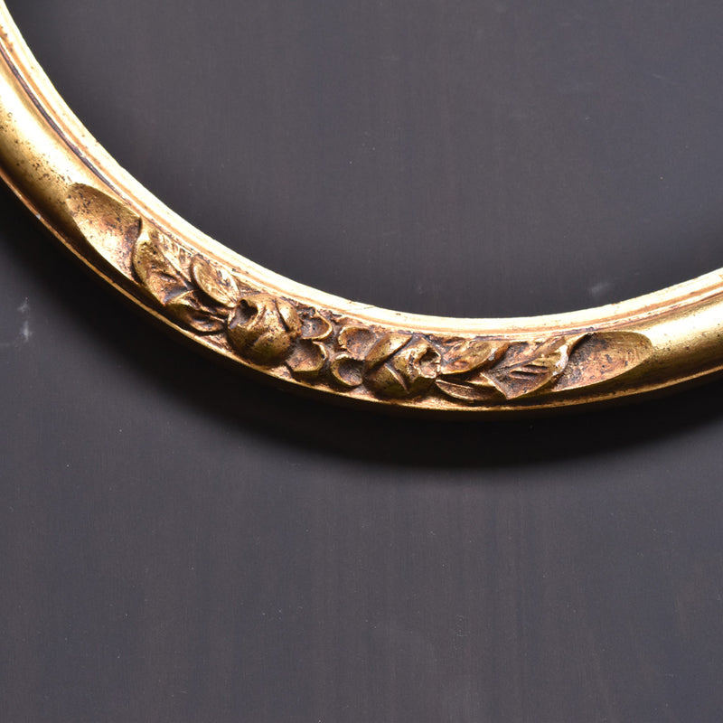 Antique oval gold floral frame