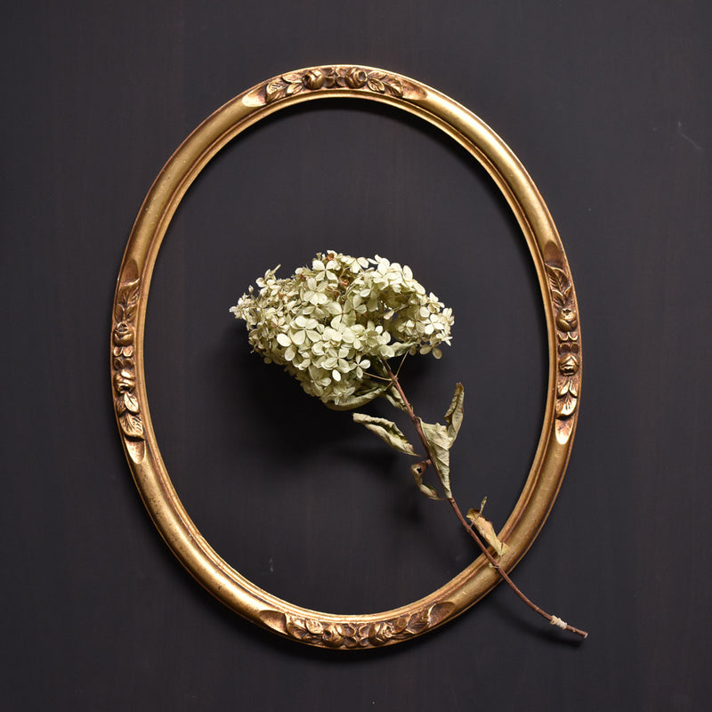 Antique oval gold floral frame