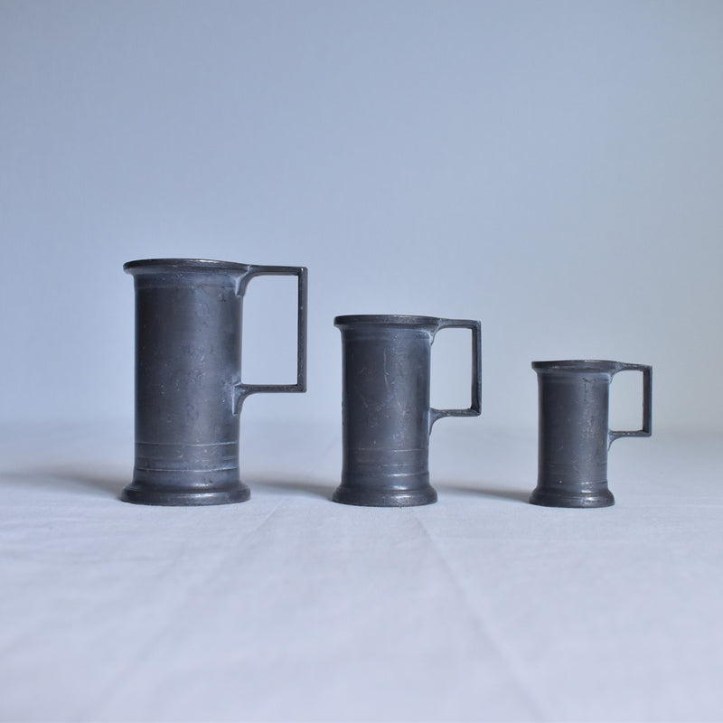 Pewter measuring cups - set of 3