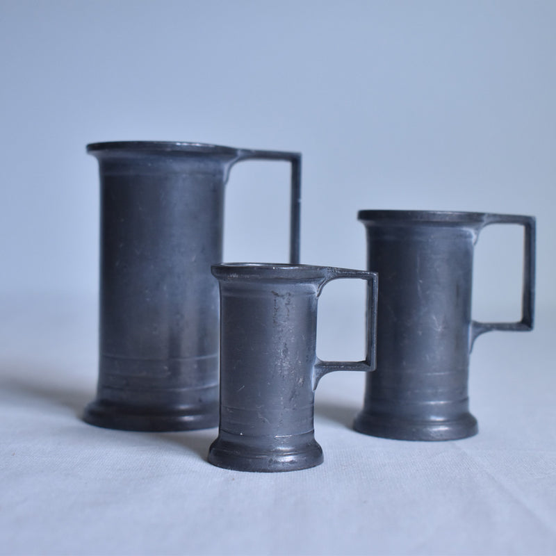 Pewter measuring cups - set of 3